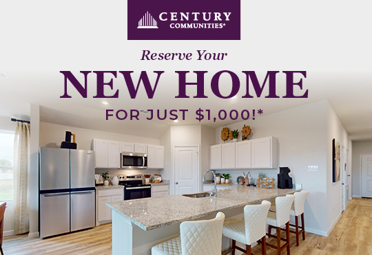 A kitchen with a table and chairs.