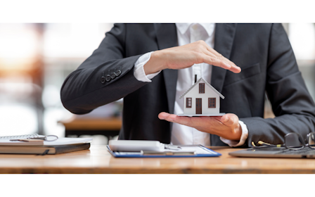 A person holding a card.