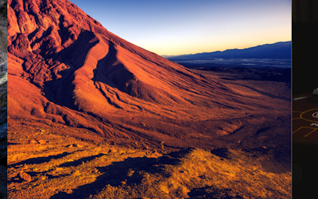 A person standing on a cliff.