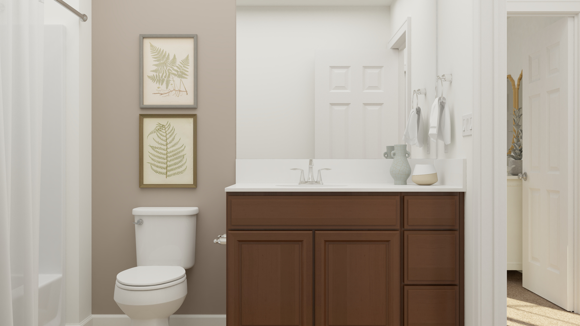 A bathroom with a toilet and sink.