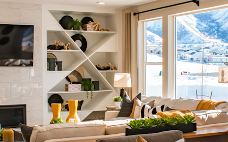 A living room with a fireplace.