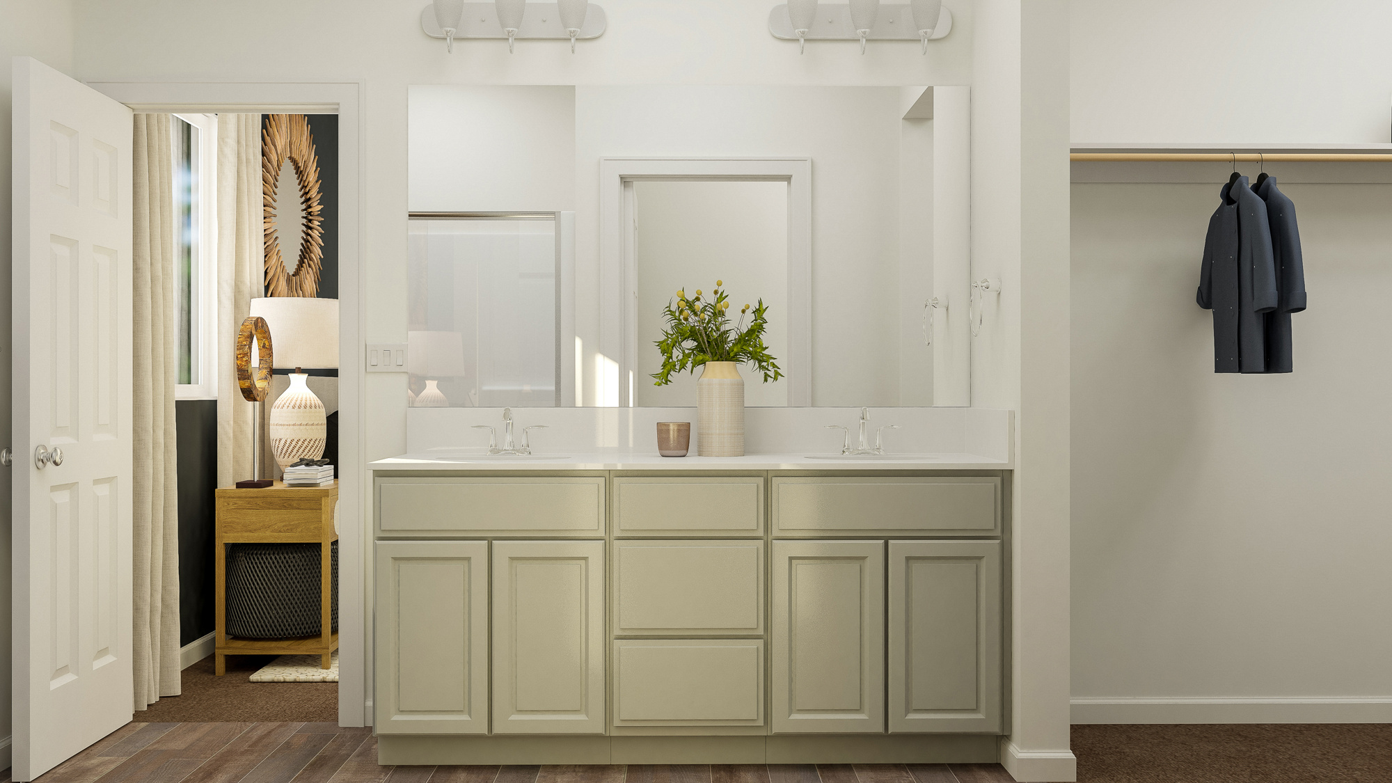 A bathroom with white cabinets.