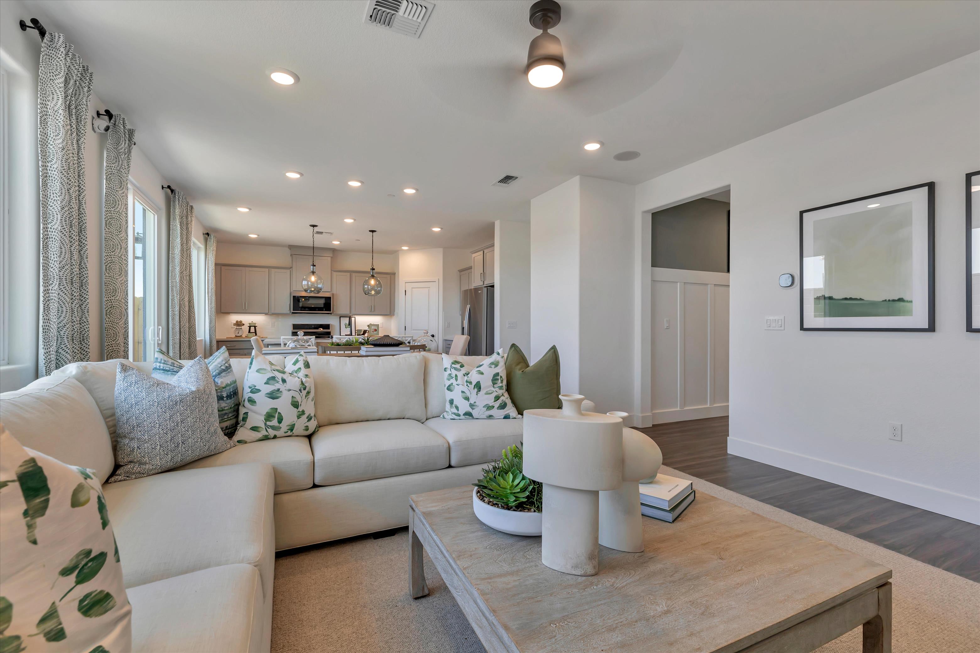 A living room with a couch and a coffee table.