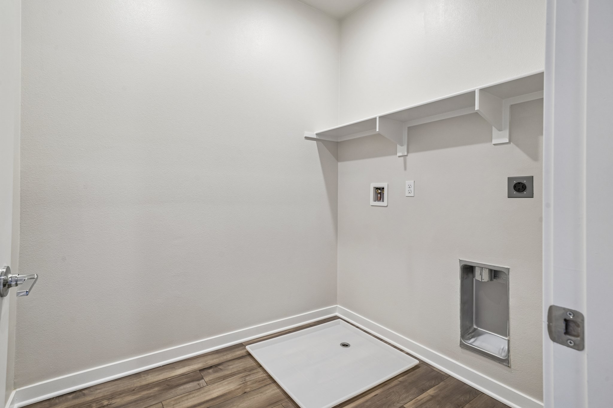 A bathroom with a tub and a sink.