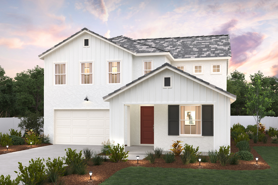 A white house with a black roof.