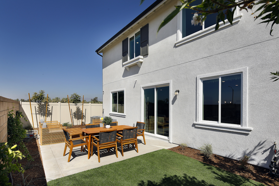 A house with a table and chairs.