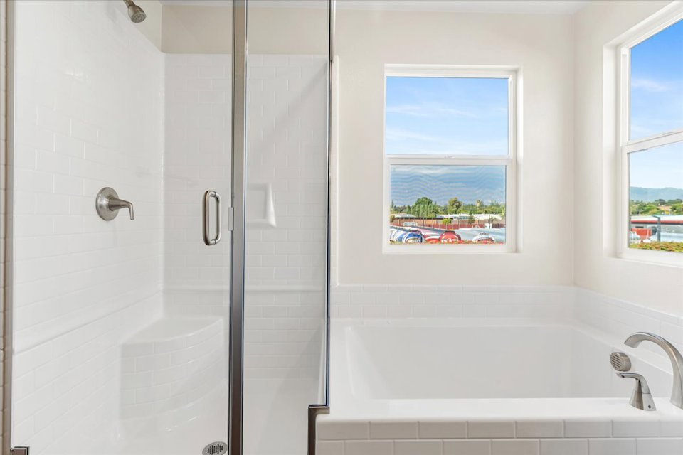 A bathroom with a glass shower.