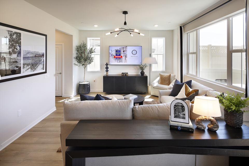 A living room with a large window.