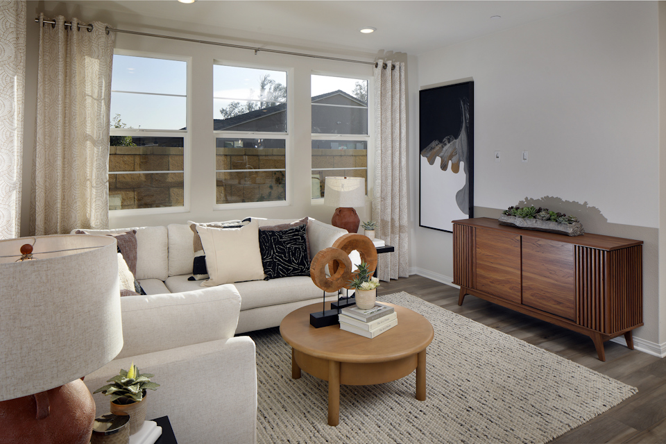 A living room with a large window.