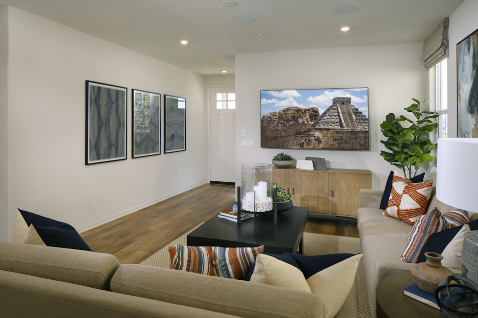A living room with a couch and a coffee table.