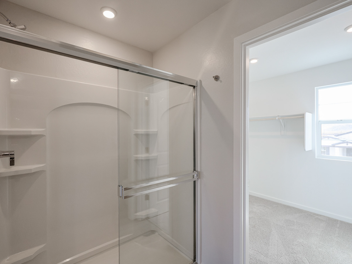 A shower unit in a bathroom.