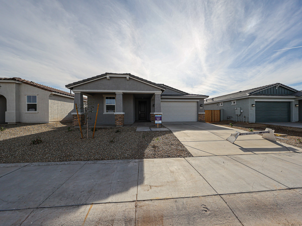 A group of buildings with a blue sky.