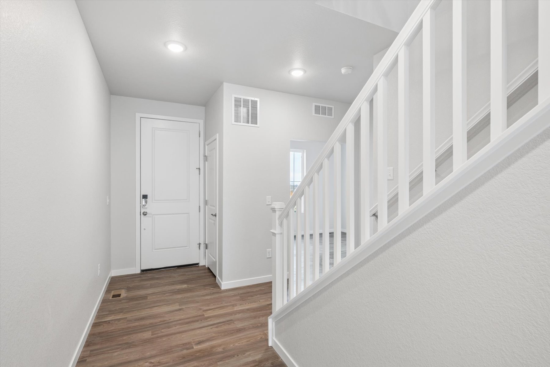 A white staircase in a house.