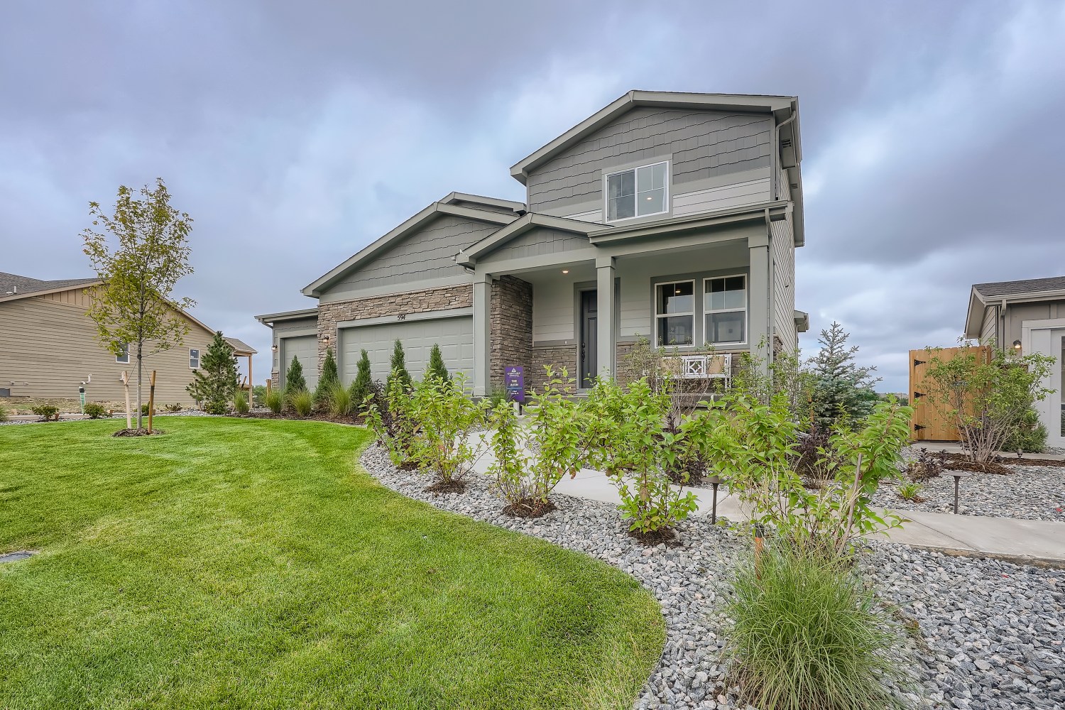 A house with a garden in front.