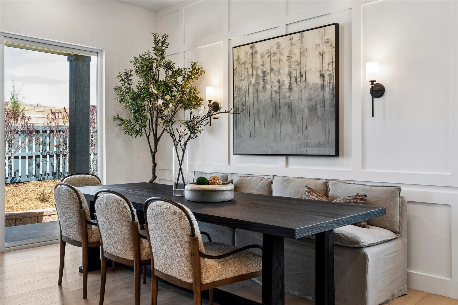 A table with chairs around it.