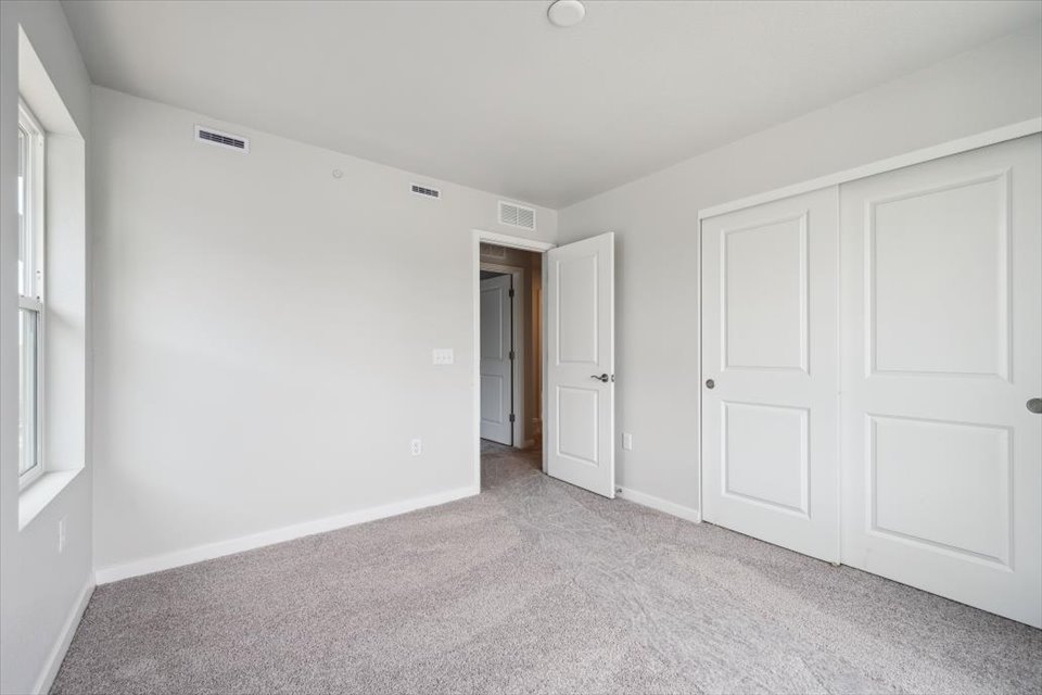 A room with white doors.