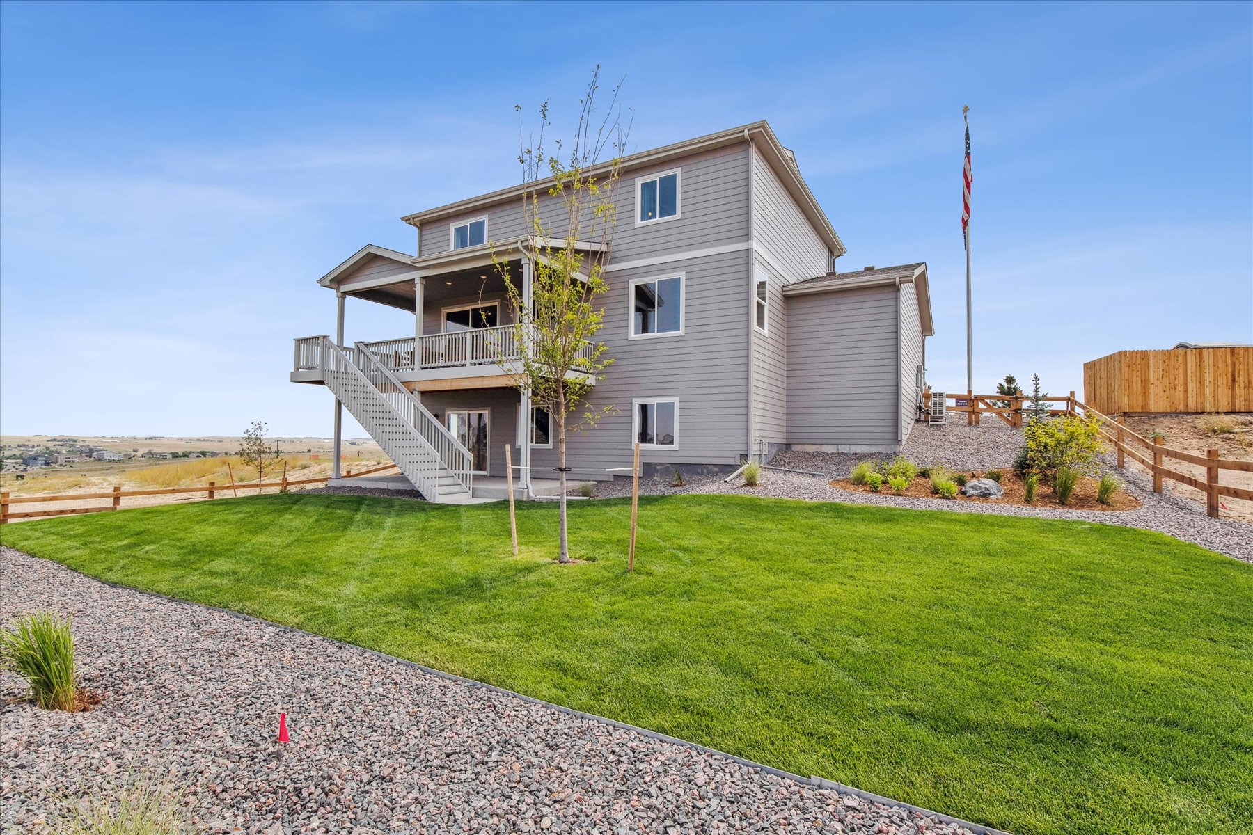 A house with a grass yard.