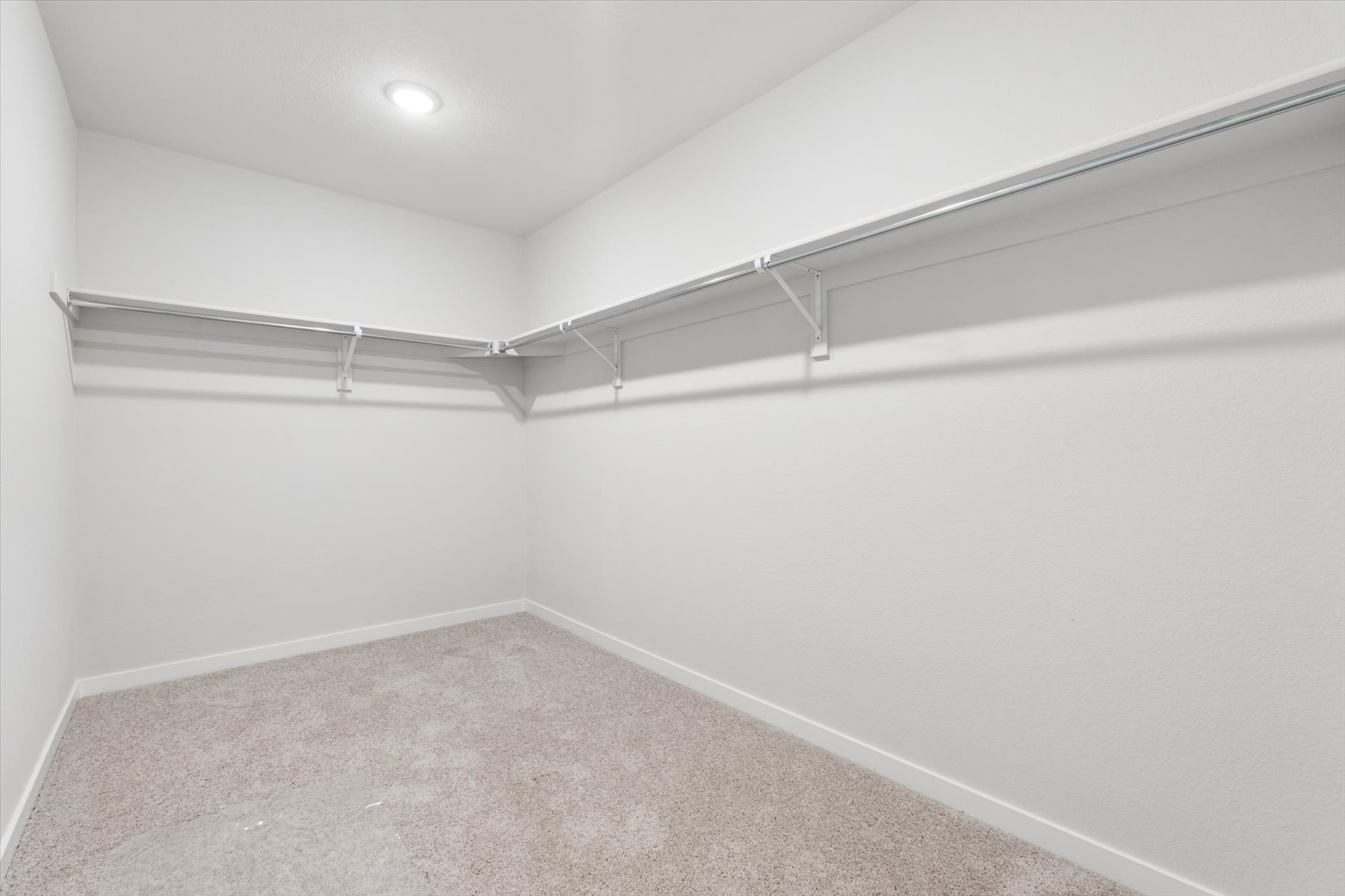 A white room with a white wall.