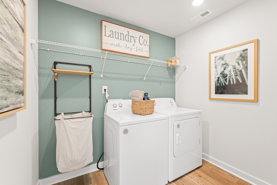 A laundry room with a washer and dryer.