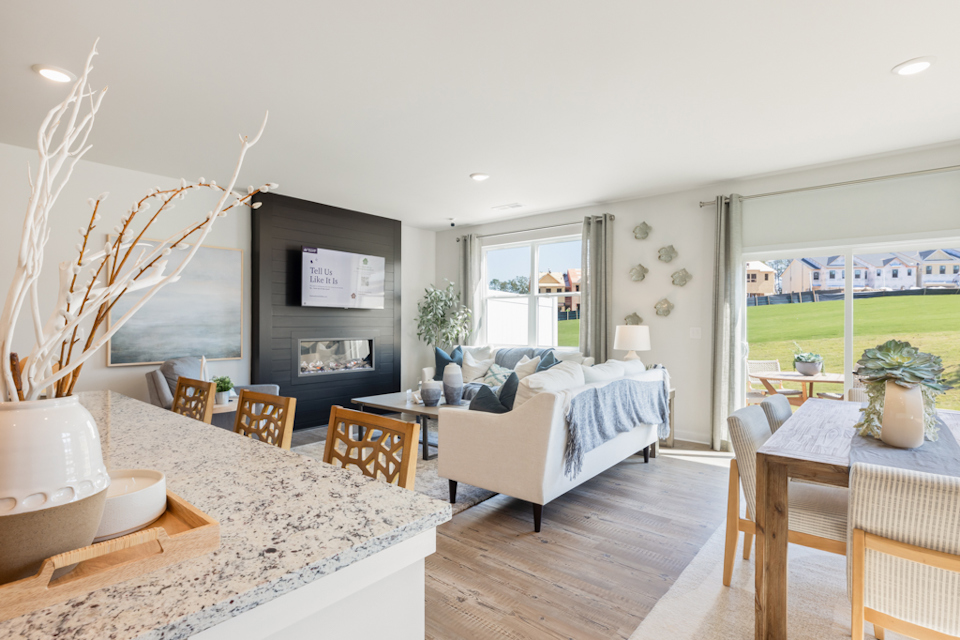 A living room with a large window.