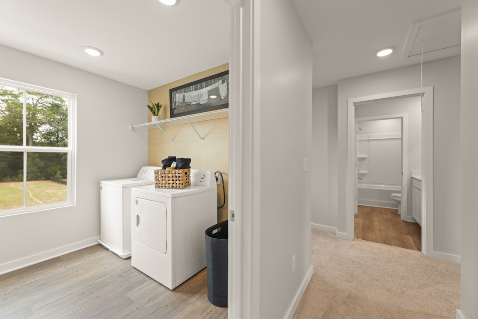 A room with a white cabinet and a white counter top.