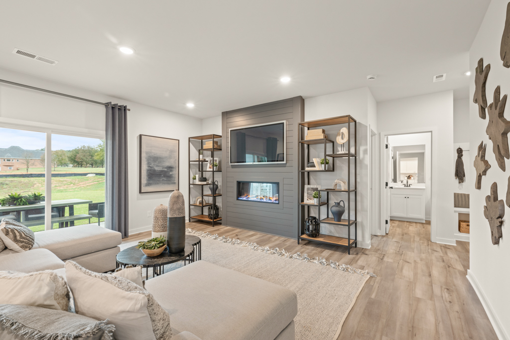 A living room with a large window.