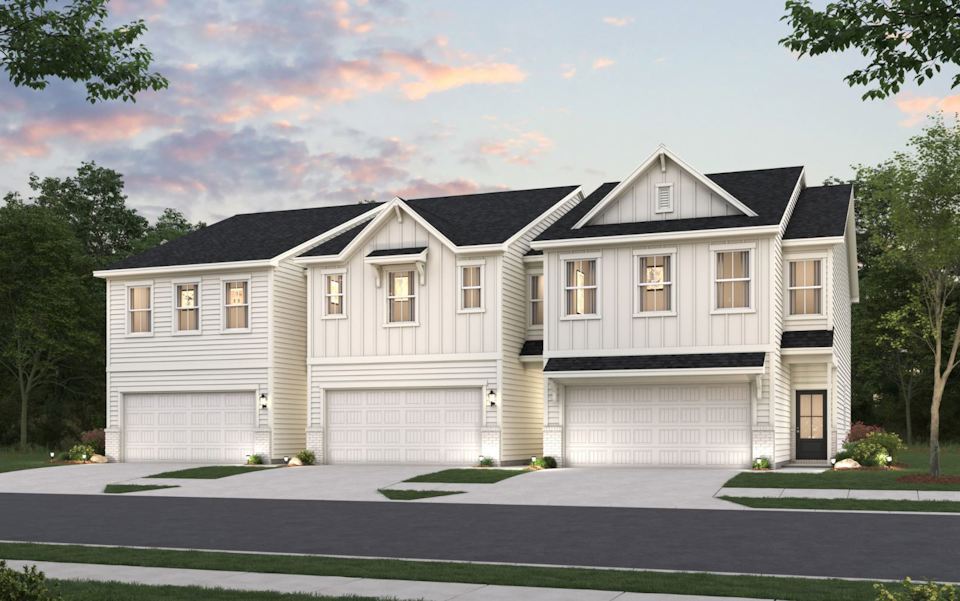 A large house with a driveway.