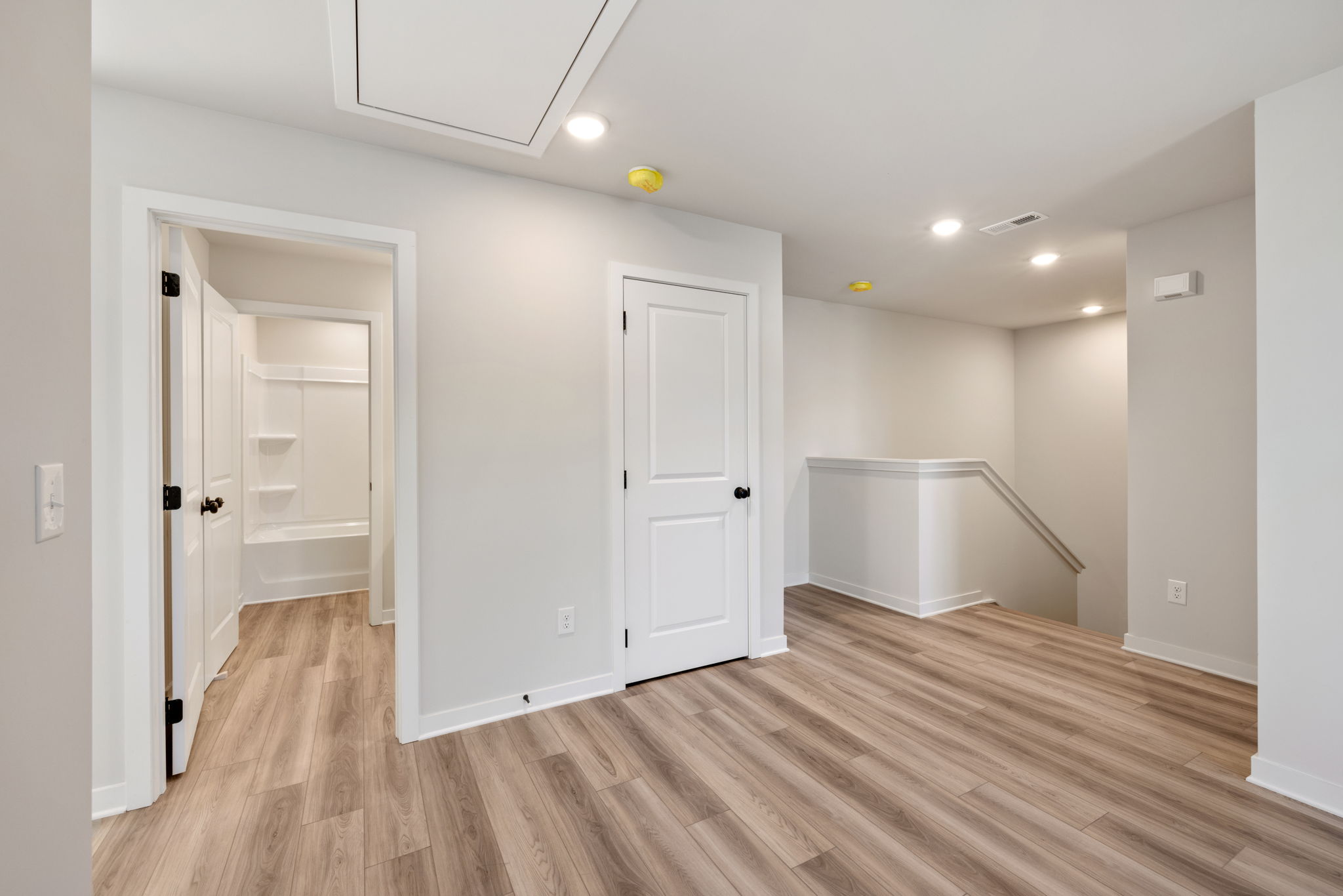 A room with white doors.