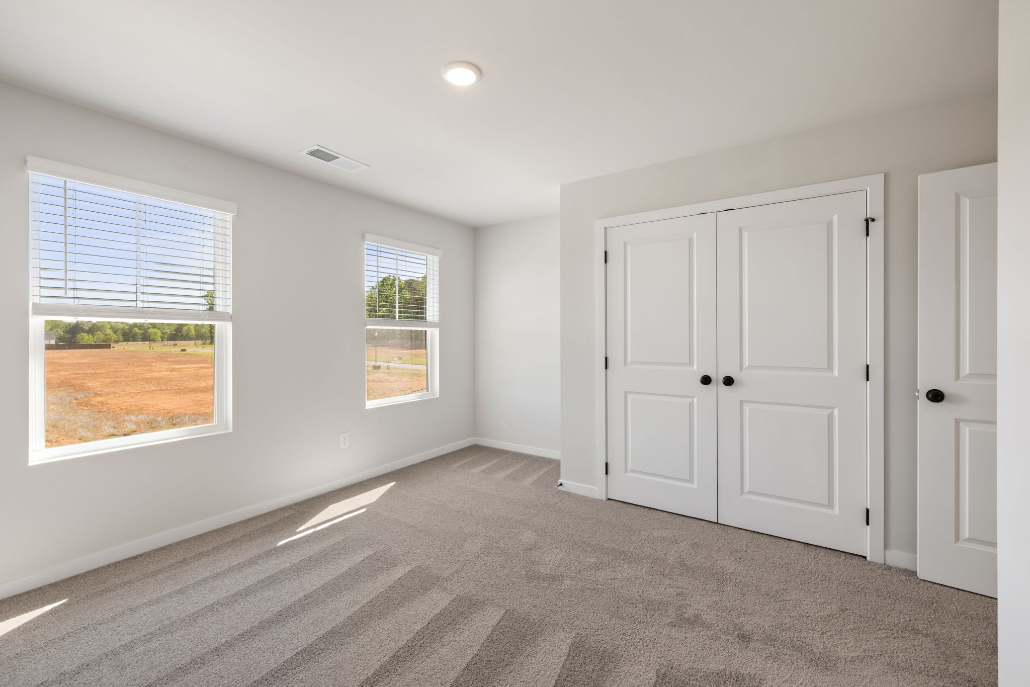 A room with white doors.