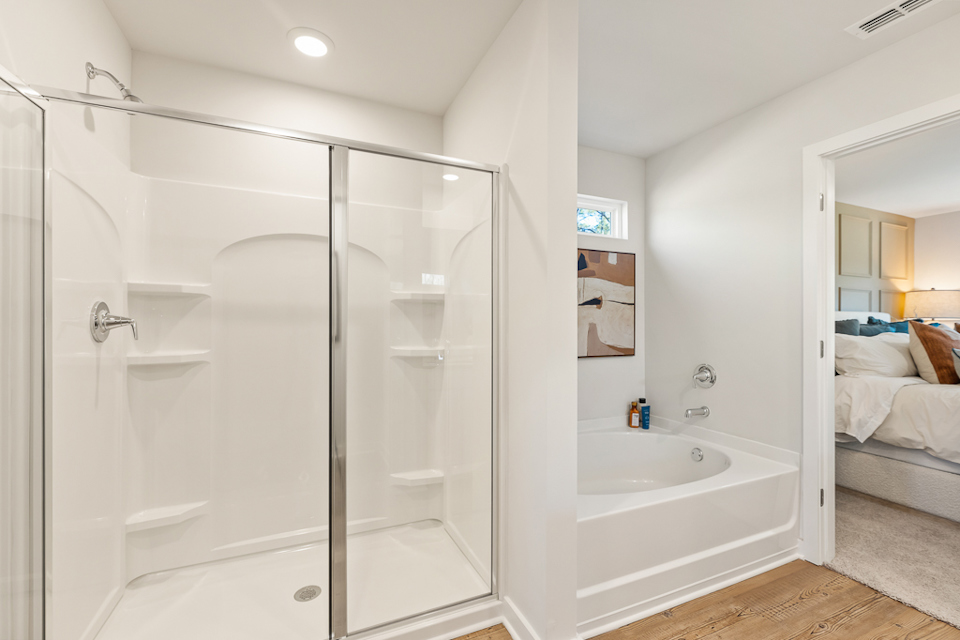 A bathroom with a glass shower.