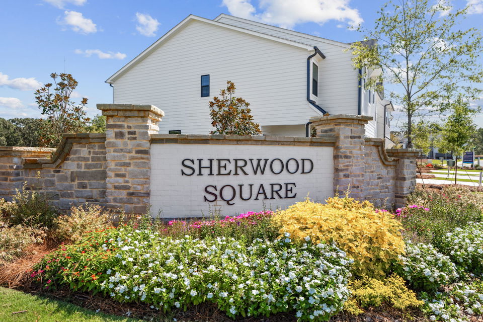 A sign in front of a building.