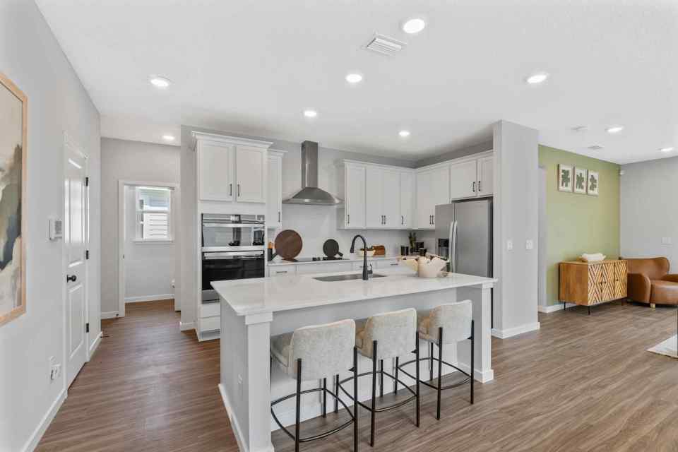 Silverbell II Model Home Kitchen with Island at Camden Woods in Kingsland, GA