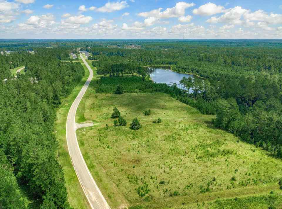 A river running through a grassy area.