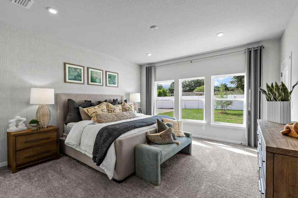 A room with a bed and a couch.