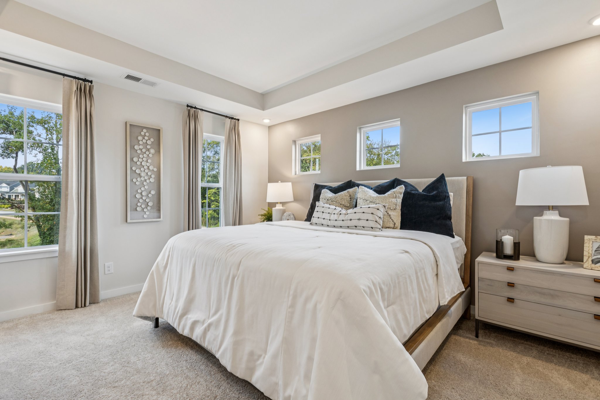 A bedroom with a large bed.