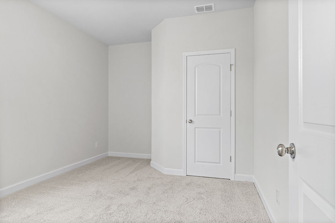 A room with white doors.