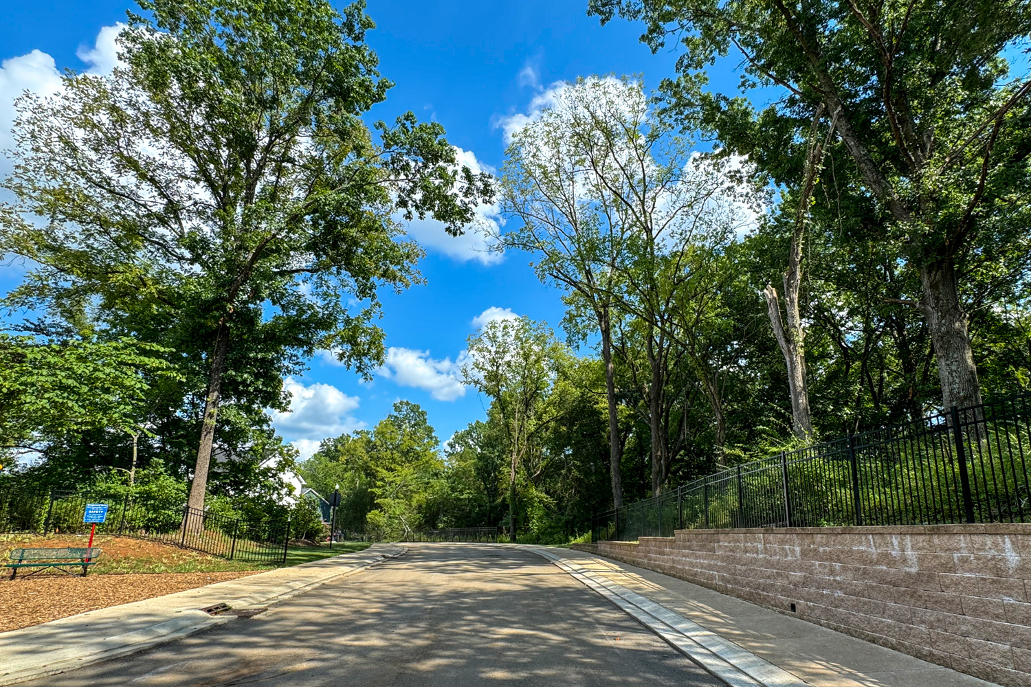 A road with trees on the side.