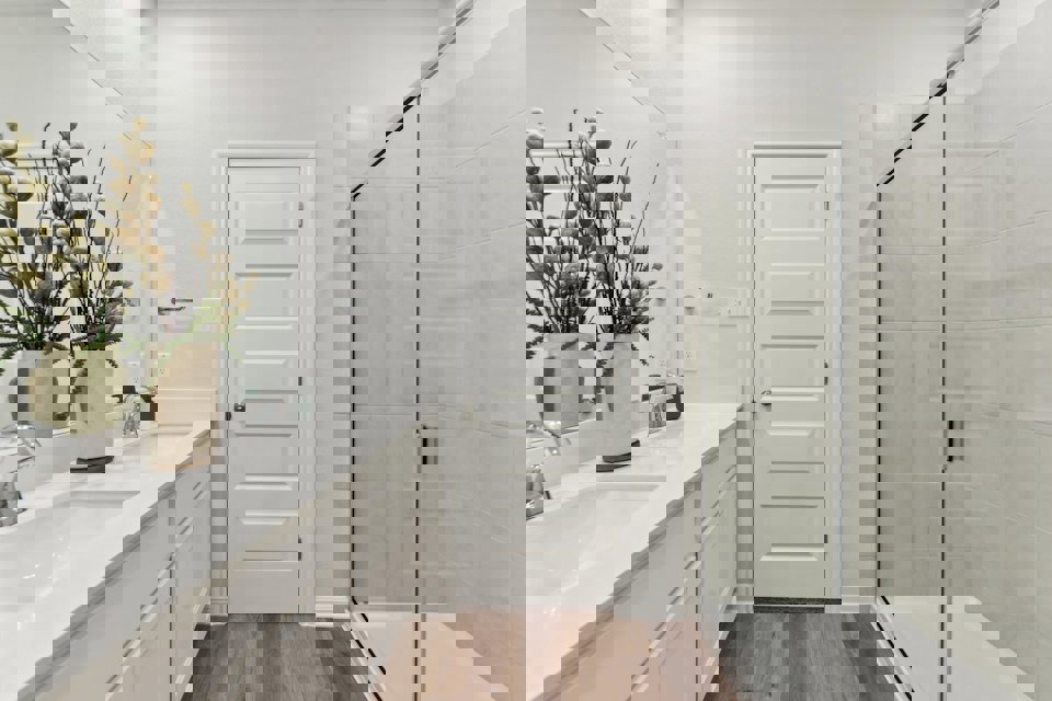 A bathroom with a glass shower.