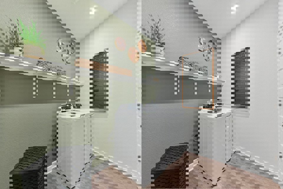 A room with a shelf and a table with a plant on it.