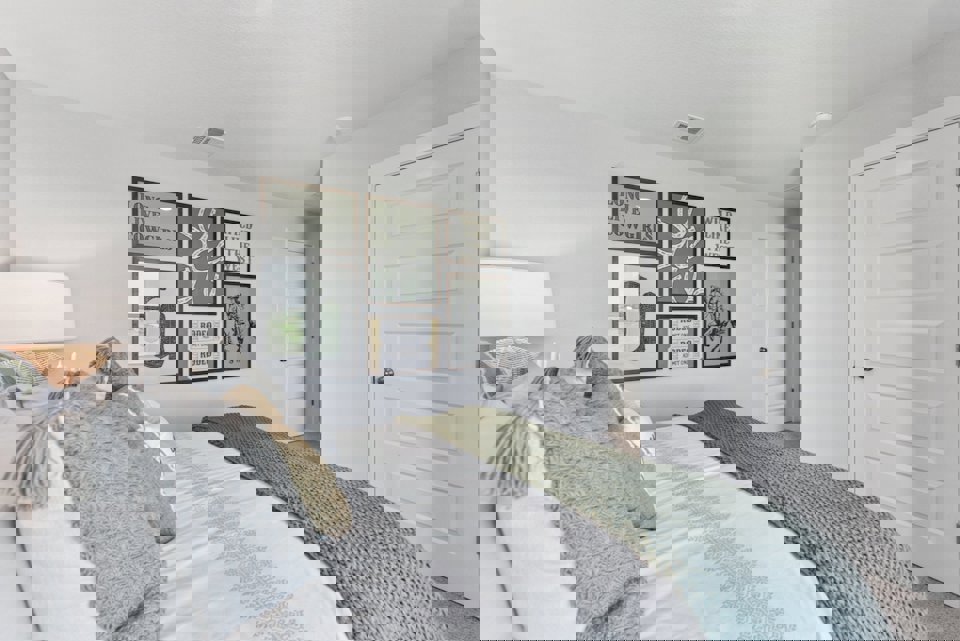 A bed with a white door.