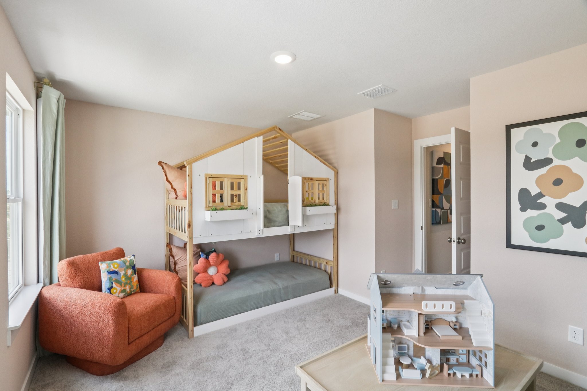 A living room with a bed and a couch.