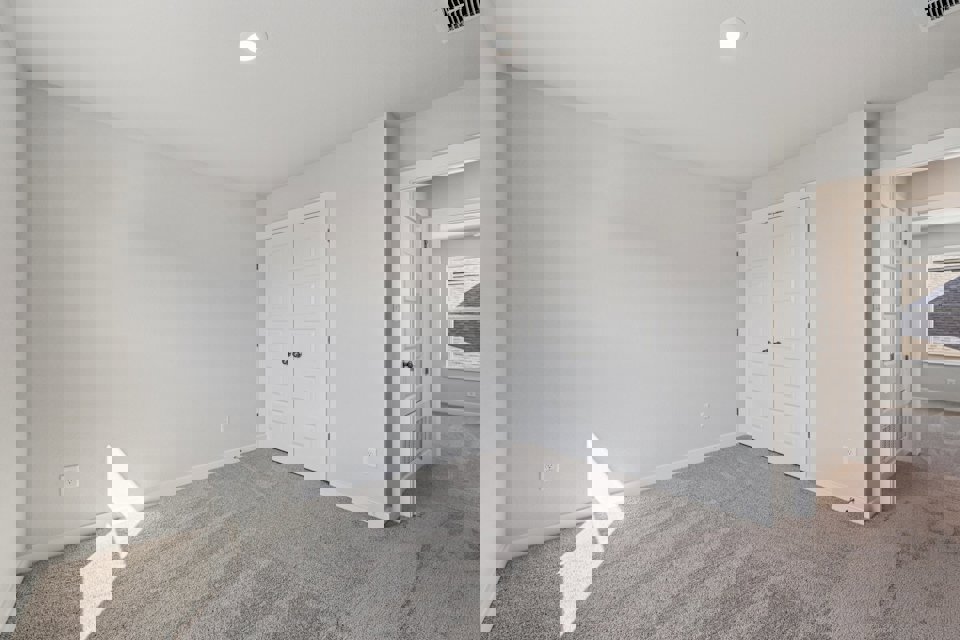 A room with white doors.