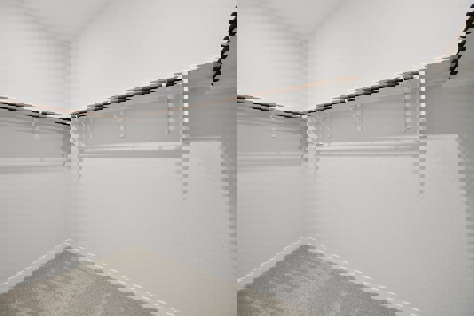 A white staircase in a room.