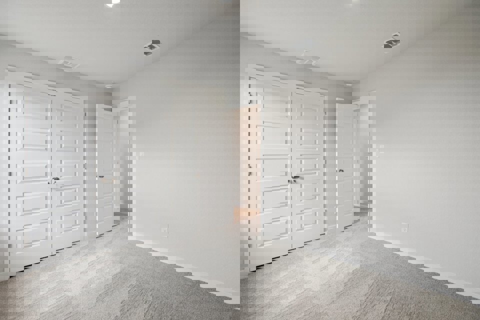 A room with white doors.