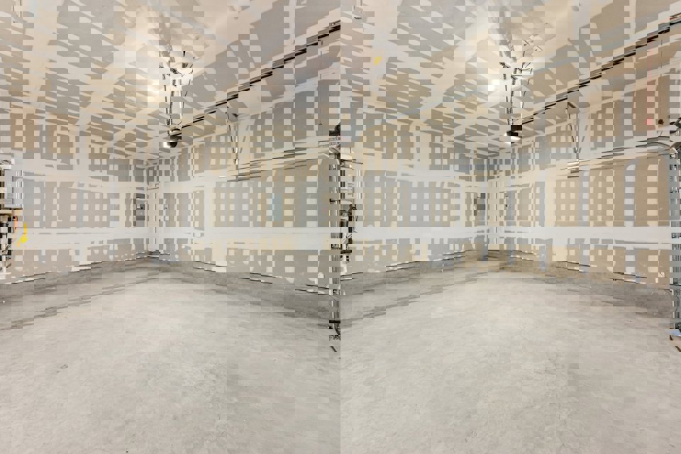 A room with a white wall and a white floor.