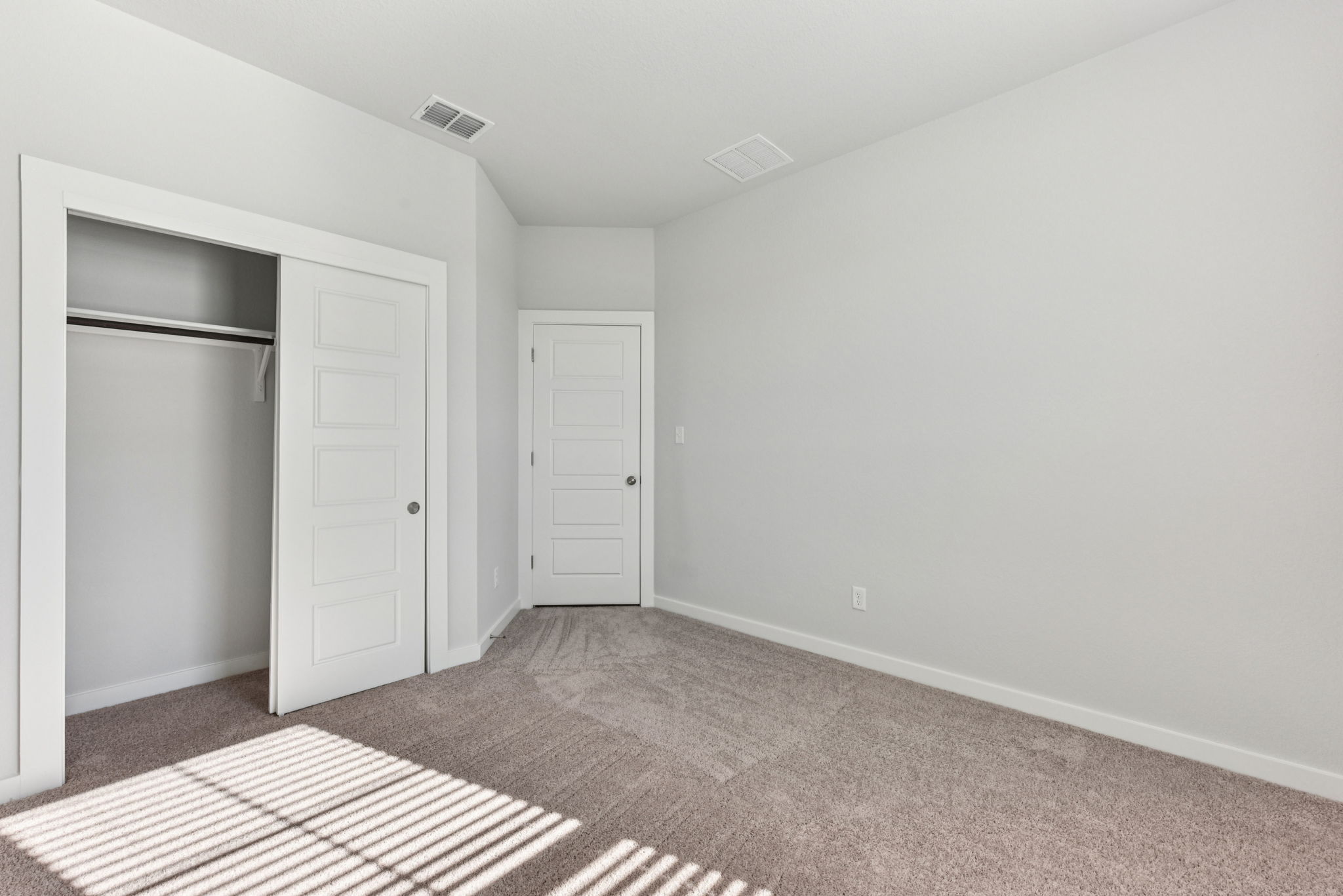 A room with white doors.