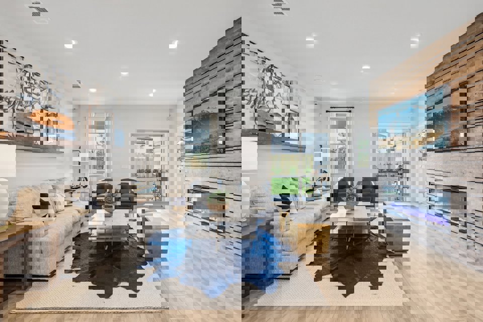 A living room with a fireplace.