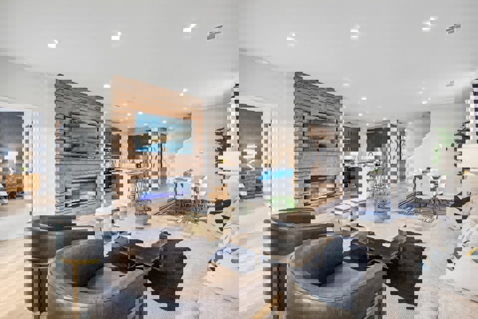 A living room with a fireplace.