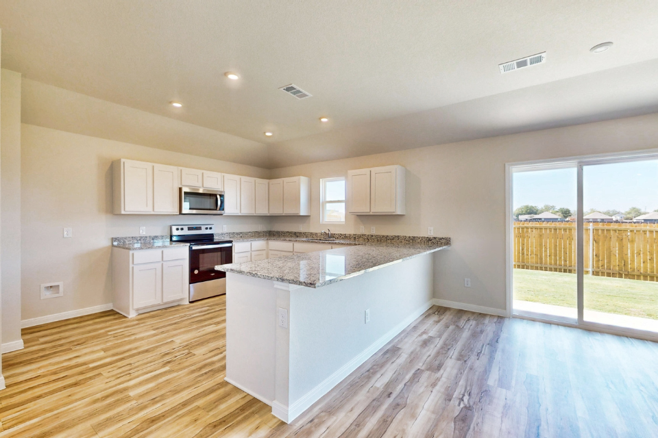 A kitchen with a large island.