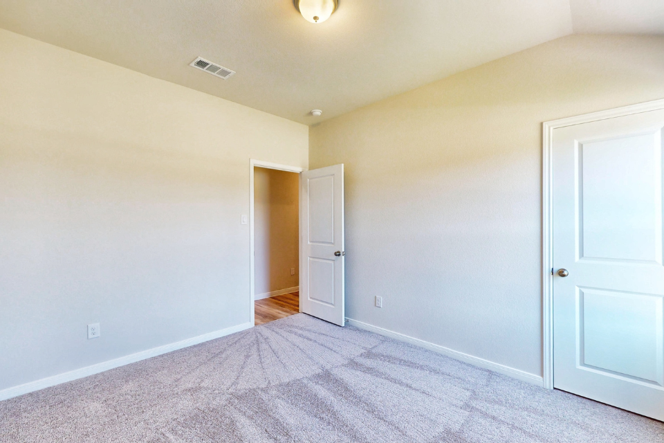 A room with white doors.